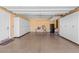 This is a finished two car garage with epoxy floors and storage cabinets at 5410 Serenity Brook Dr, Las Vegas, NV 89149