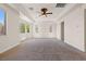 Large, bright great room with trey ceiling and bay window lets in ample light at 5410 Serenity Brook Dr, Las Vegas, NV 89149