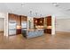 Open-concept kitchen with a large island, stainless steel appliances, and tile flooring at 5410 Serenity Brook Dr, Las Vegas, NV 89149