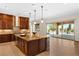 Gorgeous kitchen island that overlooks the exterior patio, perfect for entertaining at 5410 Serenity Brook Dr, Las Vegas, NV 89149