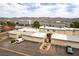 An aerial view of this home shows multi car garages and mountain views at 555 Rene Ln, Henderson, NV 89015