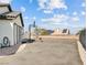 Large driveway area with a basketball hoop and side access entry, perfect for active recreation and convenience at 5865 Egan Crest Dr, Las Vegas, NV 89149