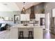 Elegant kitchen with a large island, pendant lighting, and stainless steel appliances at 5865 Egan Crest Dr, Las Vegas, NV 89149