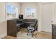 Bright office area featuring built-in desk and a comfortable executive chair at 5865 Egan Crest Dr, Las Vegas, NV 89149
