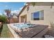 Inviting backyard hot tub on a wooden deck, perfect for relaxation and entertaining guests at 6059 Wheat Penny Ave, Las Vegas, NV 89122