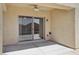 Covered patio featuring concrete flooring and a sliding glass door for indoor-outdoor living at 6059 Wheat Penny Ave, Las Vegas, NV 89122