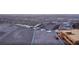 Aerial view of a vacant lot with views of the city and surrounding neighborhood at 611 Grand Rim Dr, Henderson, NV 89012