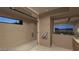 Spa-like bathroom features a spacious shower with glass doors and a view to the outdoor scenery at 611 Grand Rim Dr, Henderson, NV 89012
