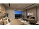 Relaxing main bedroom boasts a fireplace, city view, and stylish furnishings for a luxurious retreat at 611 Grand Rim Dr, Henderson, NV 89012