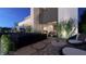 Modern patio featuring a water feature and outdoor seating perfect for relaxing at 611 Grand Rim Dr, Henderson, NV 89012