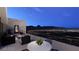 Expansive roof deck with outdoor seating, a fire pit, and panoramic city views, perfect for entertaining at 611 Grand Rim Dr, Henderson, NV 89012