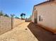 Side yard is enclosed by a block wall offering privacy and space at 632 Hitchen Post Dr, Henderson, NV 89011
