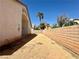 Side yard is enclosed by a block wall offering privacy and space at 632 Hitchen Post Dr, Henderson, NV 89011