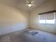 Bedroom with standard-sized window, a ceiling fan, and neutral wall colors at 632 Hitchen Post Dr, Henderson, NV 89011