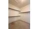 Walk-in closet featuring shelving, ample storage space, and easy organization at 632 Hitchen Post Dr, Henderson, NV 89011