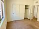 Neutral bedroom with a closet and plush carpeted flooring at 7253 Blooming Jasmine Ave, Las Vegas, NV 89117