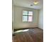 Bedroom featuring carpet floors and a window at 7253 Blooming Jasmine Ave, Las Vegas, NV 89117