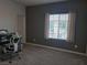 Bright bedroom with a large window and a desk setup at 7334 N Decatur Blvd # 6, Las Vegas, NV 89131