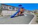 Community playground featuring slides, climbing structures, and a nearby picnic area for residents' enjoyment at 7334 N Decatur Blvd # 6, Las Vegas, NV 89131