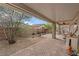 Covered patio with garden and seating, perfect for relaxation and outdoor enjoyment at 7452 Chaffinch St, North Las Vegas, NV 89084