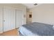 Comfortable bedroom with laminate wood floors and a large closet for ample storage at 7452 Chaffinch St, North Las Vegas, NV 89084
