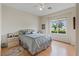 Cozy bedroom with natural light, hardwood floors, and a peaceful ambiance at 7452 Chaffinch St, North Las Vegas, NV 89084