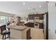 Stylish kitchen with stainless steel appliances, breakfast bar, and ample cabinet space at 7452 Chaffinch St, North Las Vegas, NV 89084