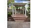 The backyard has an outdoor gazebo with space for relaxing or entertaining at 810 Socorro Song Ln, Henderson, NV 89052