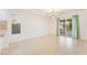 Bright dining area with tile flooring, sliding door, and light-colored walls at 810 Socorro Song Ln, Henderson, NV 89052