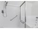 Clean bathroom featuring a shower with a hand-held shower head, grab bar, and bathtub at 823 Crabapple Dr, Henderson, NV 89002