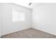 Bright bedroom with neutral carpet, one window for natural light and fresh paint at 823 Crabapple Dr, Henderson, NV 89002