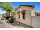 Cozy home exterior showcasing decorative window shutters and neutral paint at 8560 Alocasia Ct, Las Vegas, NV 89149