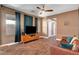 Comfortable living room with wood-look floors and view to hallway at 8560 Alocasia Ct, Las Vegas, NV 89149