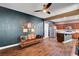 Living room open to kitchen featuring hardwood floors and stylish furnishings at 8560 Alocasia Ct, Las Vegas, NV 89149
