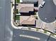 Birds eye view of the homes showcasing their rooflines, driveways and landscaped yards in a residential neighborhood at 8710 Beverly Grove Ct, Las Vegas, NV 89113
