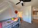 Comfortable bedroom featuring a ceiling fan, closet, and a sunny atmosphere at 8710 Beverly Grove Ct, Las Vegas, NV 89113