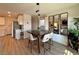 Inviting dining room with a view into the living room and kitchen at 8710 Beverly Grove Ct, Las Vegas, NV 89113