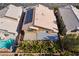Aerial view of a home with a tile roof, solar panels, backyard patio, and swimming pool at 9785 Gallo Dr, Las Vegas, NV 89147