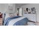 Charming bedroom with a cozy bed, white dresser, and decorated with lots of personality at 10422 Prairie Mountain Ave, Las Vegas, NV 89166
