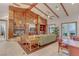 Cozy clubhouse interior featuring a fireplace, comfortable seating, and stylish decor at 10422 Prairie Mountain Ave, Las Vegas, NV 89166