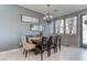 Dining area featuring a dining table and a set of chairs and neutral colored walls at 10422 Prairie Mountain Ave, Las Vegas, NV 89166