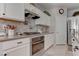 Modern kitchen featuring stainless steel appliances, granite countertops, subway tile and white cabinets at 10422 Prairie Mountain Ave, Las Vegas, NV 89166