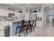 Eat-in kitchen with white cabinets and granite countertops and stainless steel appliances at 10422 Prairie Mountain Ave, Las Vegas, NV 89166