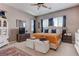 Comfortable primary bedroom featuring soft carpet, neutral tones, and ample natural light at 10422 Prairie Mountain Ave, Las Vegas, NV 89166