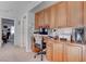 Functional built-in office space with ample cabinetry for storage and workspace at 10422 Prairie Mountain Ave, Las Vegas, NV 89166