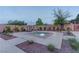 Community spa surrounded by lush, mature landscaping at 10422 Prairie Mountain Ave, Las Vegas, NV 89166