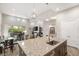 Spacious kitchen island flows into the living and dining areas, perfect for entertaining guests at 10482 Calico Terrace Ave, Las Vegas, NV 89135