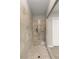This shower features tile walls, a bench seat, and a rain shower head at 10482 Calico Terrace Ave, Las Vegas, NV 89135
