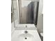 Bathroom featuring a single sink vanity with a framed mirror and tile flooring at 10525 Autumn Pine Ave # 203, Las Vegas, NV 89144