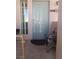 Charming entry with a light blue front door and adjacent window, leading into the home at 10525 Autumn Pine Ave # 203, Las Vegas, NV 89144